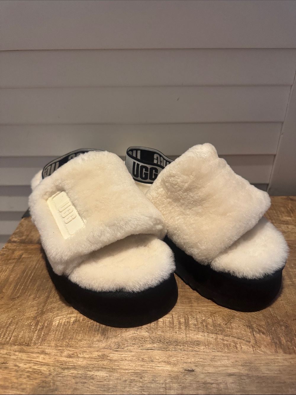 UGG Cream Shearling Slide Sandals with Black Sole